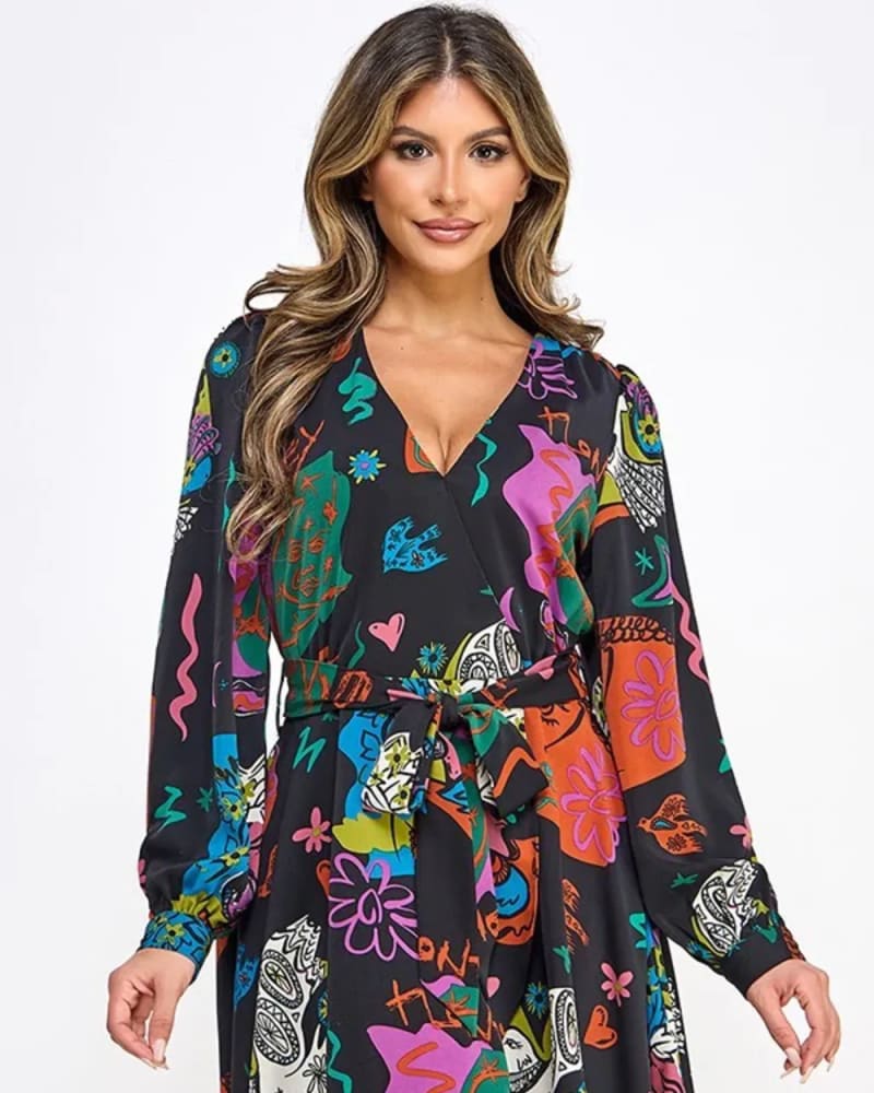 Front of a model wearing a size L Printed Long Sleeve Mini Dress With Belt in Black by Très Chic. | dia_product_style_image_id:321728
